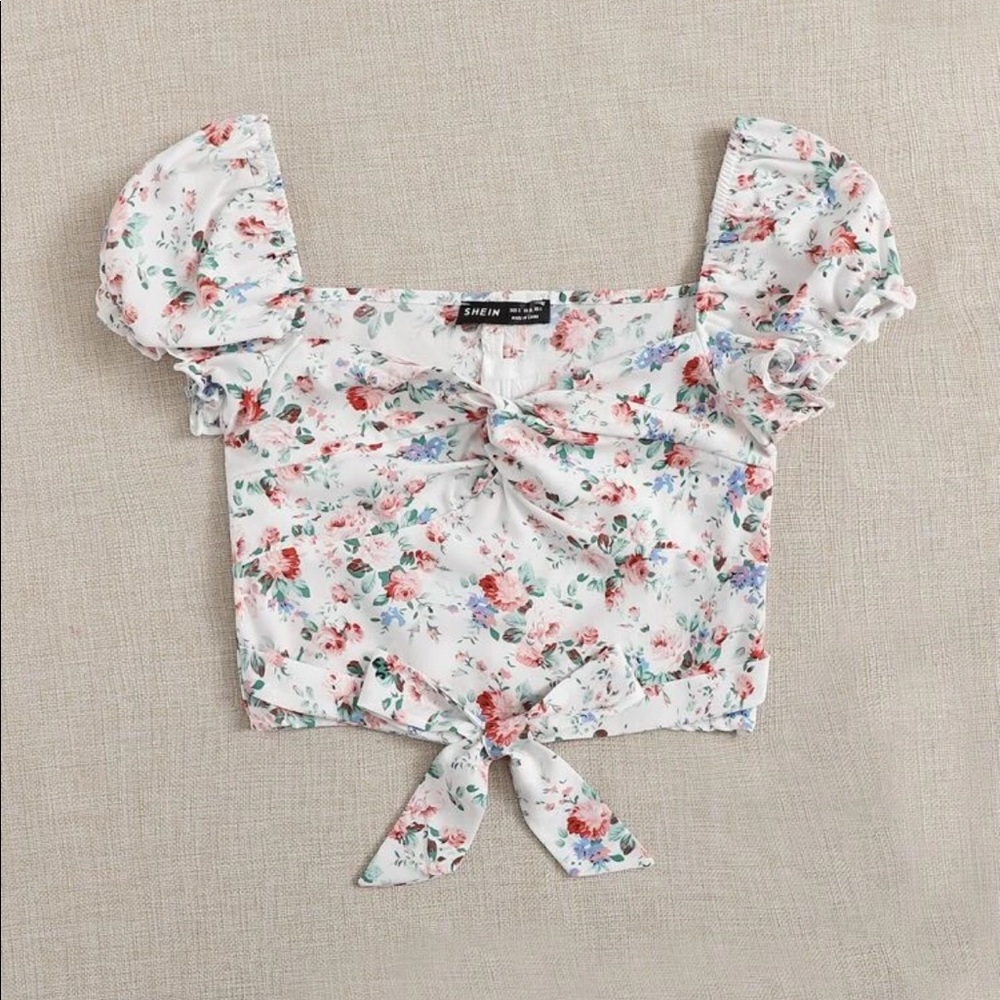 Twist front knot hem floral top